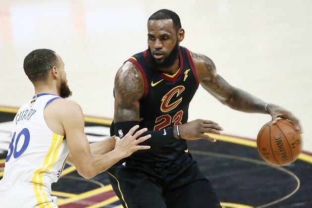 CLEVELAND, CA - JUN 8: LeBron James #23 of the Cleveland Cavaliers handles the ball against Stephen Curry #30 of the Golden State Warriors in Game Four of the 2018 NBA Finals won 108-85 by the Golden State Warriors over the Cleveland Cavaliers at the Quicken Loans Arena on June 6, 2018 in Cleveland, Ohio. NOTE TO USER: User expressly acknowledges and agrees that, by downloading and or using this photograph, User is consenting to the terms and conditions of the Getty Images License Agreement. Mandatory Copyright Notice: Copyright 2018 NBAE (Photo by Chris Elise/NBAE via Getty Images) CLEVELAND, CA - JUN 8: LeBron James #23 of the Cleveland Cavaliers handles the ball against Stephen Curry #30 of the Golden State Warriors in Game Four of the 2018 NBA Finals won 108-85 by the Golden State Warriors over the Cleveland Cavaliers at the Quicken Loans Arena on June 6, 2018 in Cleveland, Ohio. NOTE TO USER: User expressly acknowledges and agrees that, by downloading and or using this photograph, User is consenting to the terms and conditions of the Getty Images License Agreement. Mandatory Copyright Notice: Copyright 2018 NBAE (Photo by Chris Elise/NBAE via Getty Images)