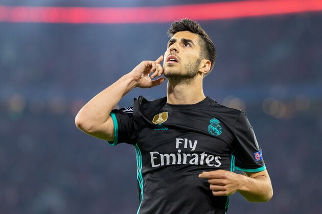 MUNICH, GERMANY - APRIL 25: Marco Asensio of Real Madrid celebrates after scoring his team's second goal during the UEFA Champions League Semi Final First Leg match between Bayern Muenchen and Real Madrid at the Allianz Arena on April 25, 2018 in Munich, Germany. (Photo by Boris Streubel/Getty Images) MUNICH, GERMANY - APRIL 25: Marco Asensio of Real Madrid celebrates after scoring his team's second goal during the UEFA Champions League Semi Final First Leg match between Bayern Muenchen and Real Madrid at the Allianz Arena on April 25, 2018 in Munich, Germany. (Photo by Boris Streubel/Getty Images)