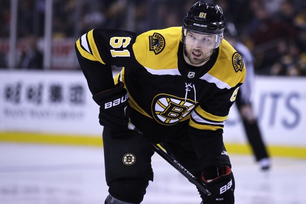 Boston Bruins left wing Rick Nash (61) waits for the face off during the second period of an NHL hockey game in Boston, Tuesday, March 6, 2018. (AP Photo/Charles Krupa)
