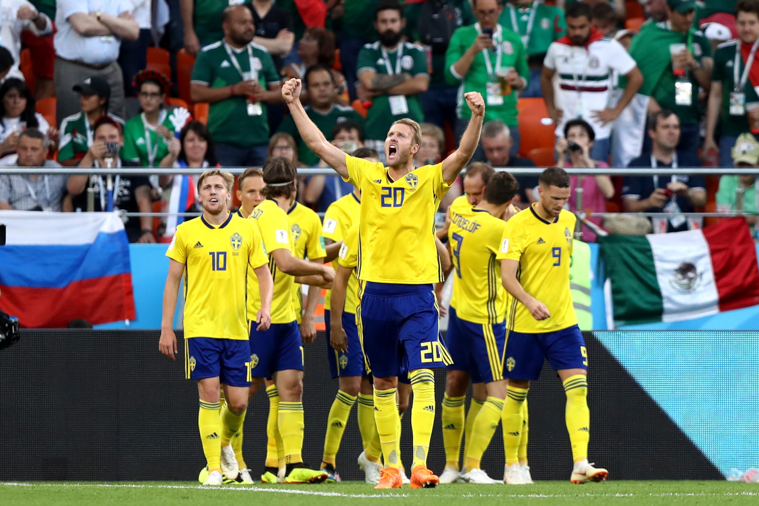 YEKATERINBURG, RUSSIA - JUNE 27:  Andreas Granqvist of Sweden celebrates with teammates after scoring his team's second goal during the 2018 FIFA World Cup Russia group F match between Mexico and Sweden at Ekaterinburg Arena on June 27, 2018 in Yekaterinburg, Russia.  (Photo by Ryan Pierse/Getty Images)
