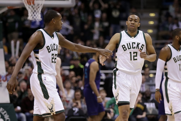 MILWAUKEE, WI - MARCH 26: Jabari Parker #12 of the Milwaukee Bucks celebrates with Khris Middleton #22 after slam dunking the basketball during the third quarter against the Charlotte Hornets during the third quarter against the Milwaukee Bucks at BMO Harris Bradley Center on March 26, 2016 in Milwaukee, Wisconsin. NOTE TO USER: User expressly acknowledges and agrees that, by downloading and or using this photograph, User is consenting to the terms and conditions of the Getty Images License Agreement. (Photo by Mike McGinnis/Getty Images)