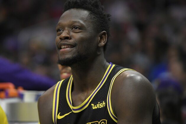 LOS ANGELES, CA - APRIL 11:  Julius Randle #30 of the Los Angeles Lakers on the bench in the second half at Staples Center on April 11, 2018 in Los Angeles, California. NOTE TO USER: User expressly acknowledges and agrees that, by downloading and or using this photograph, User is consenting to the terms and conditions of the Getty Images License Agreement. (Photo by John McCoy/Getty Images) *** Local Caption ***  Julius Randle