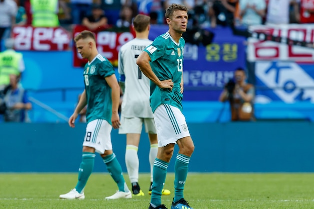 KAZAN, RUSSIA - JUNE 27: Joshua Kimmich of Germany, Thomas Mueller of Germany and Goalkeeper Manuel Neuer of Germany look dejected after the 2018 FIFA World Cup Russia group F match between Korea Republic and Germany at Kazan Arena on June 27, 2018 in Kazan, Russia. (Photo by TF-Images/Getty Images)
