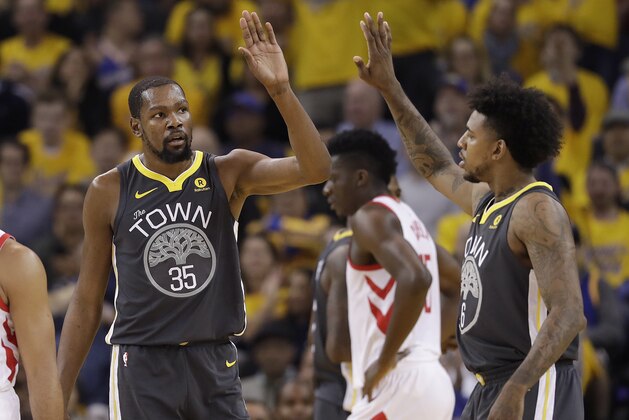Golden State Warriors forward Kevin Durant (35) celebrates with guard Nick Young during the first half of Game 4 of the NBA basketball Western Conference Finals against the Houston Rockets in Oakland, Calif., Tuesday, May 22, 2018. (AP Photo/Marcio Jose Sanchez) Golden State Warriors forward Kevin Durant (35) celebrates with guard Nick Young during the first half of Game 4 of the NBA basketball Western Conference Finals against the Houston Rockets in Oakland, Calif., Tuesday, May 22, 2018. (AP Photo/Marcio Jose Sanchez)
