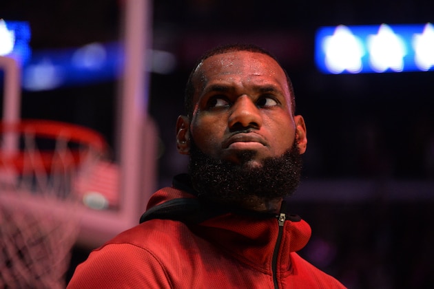 LOS ANGELES, CA - MARCH 11:  LeBron James #23 of the Cleveland Cavaliers looks on during the national anthem before the game against the Los Angeles Lakers on March 11, 2018 at STAPLES Center in Los Angeles, California. NOTE TO USER: User expressly acknowledges and agrees that, by downloading and/or using this Photograph, user is consenting to the terms and conditions of the Getty Images License Agreement. Mandatory Copyright Notice: Copyright 2018 NBAE (Photo by Andrew D. Bernstein/NBAE via Getty Images)