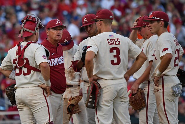 Omaha, NE - JUNE 27:  Head coach Dave Van Horn #2 of the Arkansas Razorbacks makes a pitching change in the fifth inning against the Oregon State Beavers during game two of the College World Series Championship Series on June 27, 2018 at TD Ameritrade Park in Omaha, Nebraska.  (Photo by Peter Aiken/Getty Images)