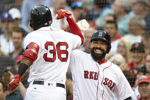 BOSTON, MA - JUNE 27: Eduardo Nunez #36 of the Boston Red Sox reacts with Sandy Leon #3 after hitting a solo home run during the second inning of a game against the Los Angeles Angels of Anaheim on June 27, 2018 at Fenway Park in Boston, Massachusetts. (Photo by Billie Weiss/Boston Red Sox/Getty Images)