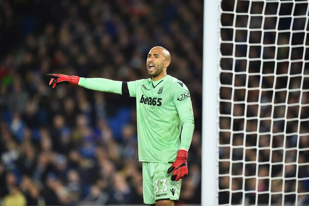Stoke City's English goalkeeper Lee Grant gestures during the English Premier League football match between Brighton and Hove Albion and Stoke City at the American Express Community Stadium in Brighton, southern England on November 20, 2017. / AFP PHOTO / Glyn KIRK / RESTRICTED TO EDITORIAL USE. No use with unauthorized audio, video, data, fixture lists, club/league logos or 'live' services. Online in-match use limited to 75 images, no video emulation. No use in betting, games or single club/league/player publications.  /         (Photo credit should read GLYN KIRK/AFP/Getty Images)