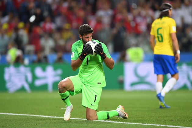 Brazil's goalkeeper Alisson kisses the ball during the Russia 2018 World Cup Group E football match between Serbia and Brazil at the Spartak Stadium in Moscow on June 27, 2018. (Photo by YURI CORTEZ / AFP) / RESTRICTED TO EDITORIAL USE - NO MOBILE PUSH ALERTS/DOWNLOADS        (Photo credit should read YURI CORTEZ/AFP/Getty Images)