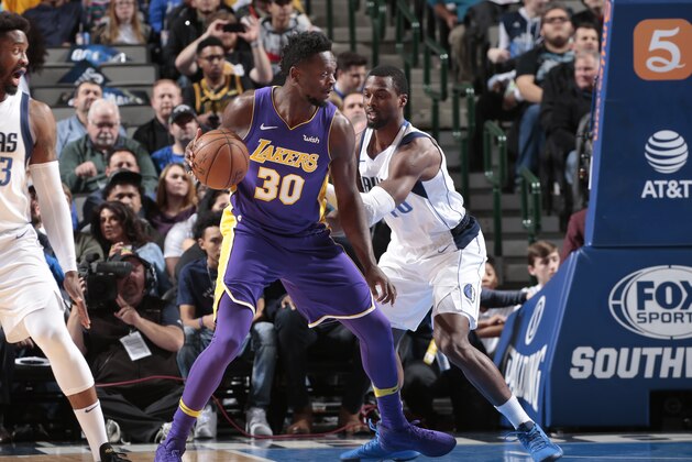 DALLAS, TX - FEBRUARY 10: Julius Randle #30 of the Los Angeles Lakers handles the ball against the Dallas Mavericks on February 10, 2018 at the American Airlines Center in Dallas, Texas. NOTE TO USER: User expressly acknowledges and agrees that, by downloading and or using this photograph, User is consenting to the terms and conditions of the Getty Images License Agreement. Mandatory Copyright Notice: Copyright 2018 NBAE (Photo by Glenn James/NBAE via Getty Images)