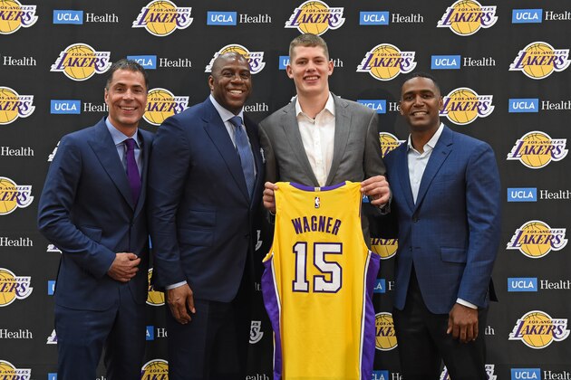 EL SEGUNDO, CA - JUNE 26:  Magic Johnson, Rob Pelinka and Luke Walton of the Los Angeles Lakers introduce 2018 NBA draft pick Moritz Wagner during an introductory press conference at the UCLA Health Training Center on June 26, 2018 in El Segundo, California. NOTE TO USER: User expressly acknowledges and agrees that, by downloading and/or using this photograph, user is consenting to the terms and conditions of the Getty Images License Agreement. Mandatory Copyright Notice: Copyright 2018 NBAE (Photo by Adam Pantozzi/NBAE via Getty Images)