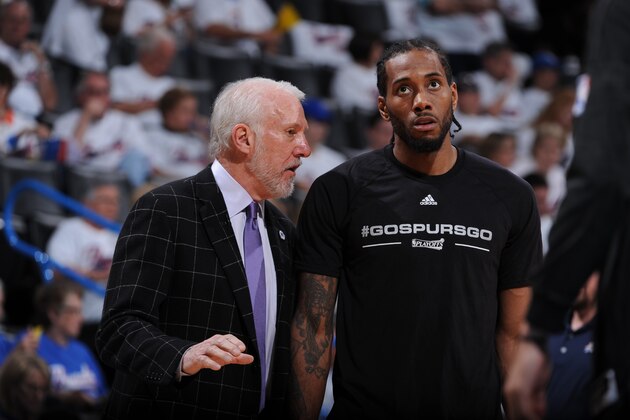 SSAN ANTONIO, TX - MAY 6: Gregg Popovich coaches Kawhi Leonard #2 of the San Antonio Spurs during the game against the Oklahoma City Thunder in Game Three of the Western Conference Semifinals of the 2016 NBA Playoffs on May 6, 2016 at the AT&T Center in San Antonio, Texas. NOTE TO USER: User expressly acknowledges and agrees that, by downloading and or using this photograph, user is consenting to the terms and conditions of the Getty Images License Agreement. Mandatory Copyright Notice: Copyright 2016 NBAE (Photo by Garrett W. Ellwood/NBAE via Getty Images)