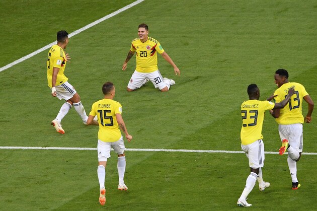 SAMARA, RUSSIA - JUNE 28:  Yerry Mina of Colombia celebrates with teammates after scoring his team's first goal during the 2018 FIFA World Cup Russia group H match between Senegal and Colombia at Samara Arena on June 28, 2018 in Samara, Russia.  (Photo by Stu Forster/Getty Images)