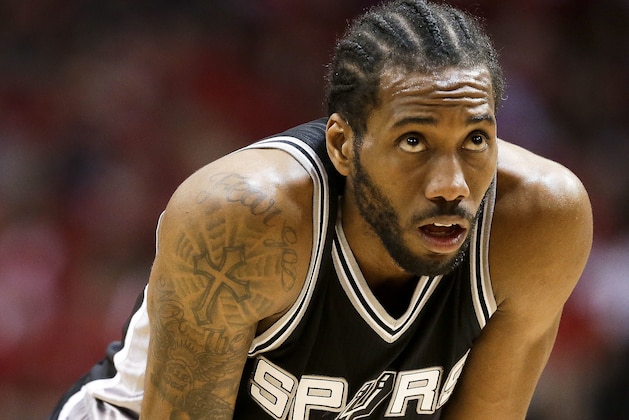 San Antonio Spurs forward Kawhi Leonard looks on during the second half in Game 3 of an NBA basketball second-round playoff series against the Houston Rockets, Friday, May 5, 2017, in Houston. San Antonio won the game 103-92. (AP Photo/Eric Christian Smith)