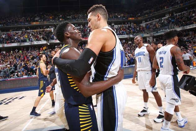 INDIANAPOLIS, IN - JANUARY 27: Victor Oladipo #4 of the Indiana Pacers and Aaron Gordon #00 of the Orlando Magic exchange a hug after the game between the two teams on January 27, 2018 at Bankers Life Fieldhouse in Indianapolis, Indiana. NOTE TO USER: User expressly acknowledges and agrees that, by downloading and or using this Photograph, user is consenting to the terms and conditions of the Getty Images License Agreement. Mandatory Copyright Notice: Copyright 2018 NBAE (Photo by Ron Hoskins/NBAE via Getty Images)