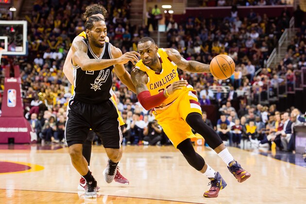 CLEVELAND, OH - JANUARY 30: Kawhi Leonard #2 of the San Antonio Spurs puts pressure on LeBron James #23 of the Cleveland Cavaliers during the first half at Quicken Loans Arena on January 30, 2016 in Cleveland, Ohio. NOTE TO USER: User expressly acknowledges and agrees that, by downloading and/or using this photograph, user is consenting to the terms and conditions of the Getty Images License Agreement. Mandatory copyright notice. (Photo by Jason Miller/Getty Images)