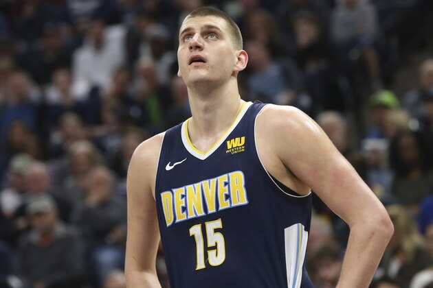 Denver Nuggets' Nikola Jokic of Serbia plays against the Minnesota Timberwolves in an NBA basketball game Wednesday, April 11, 2018, in Minneapolis. (AP Photo/Jim Mone)