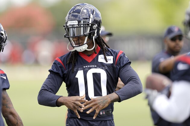 Houston Texans wide receiver DeAndre Hopkins pauses during an NFL football minicamp practice Tuesday, June 12, 2018, in Houston. (AP Photo/David J. Phillip)
