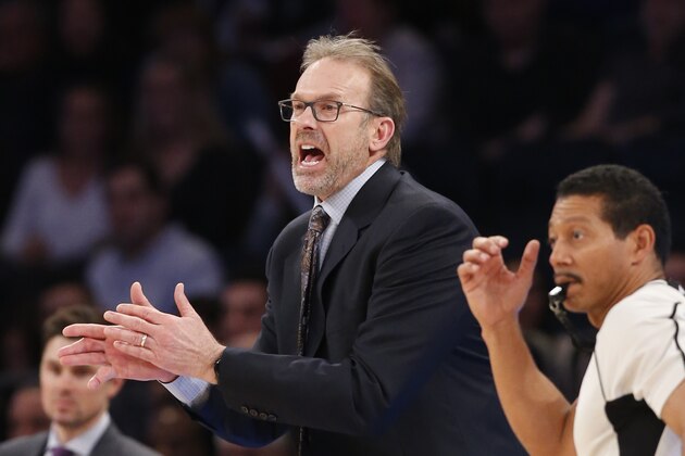 New York Knicks interim head coach Kurt Rambis yells encouragement at his players in the second half of an NBA basketball game against the Toronto Raptors at Madison Square Garden in New York, Sunday, April 10, 2016. The Raptors defeated the Knicks 93-89. (AP Photo/Kathy Willens)