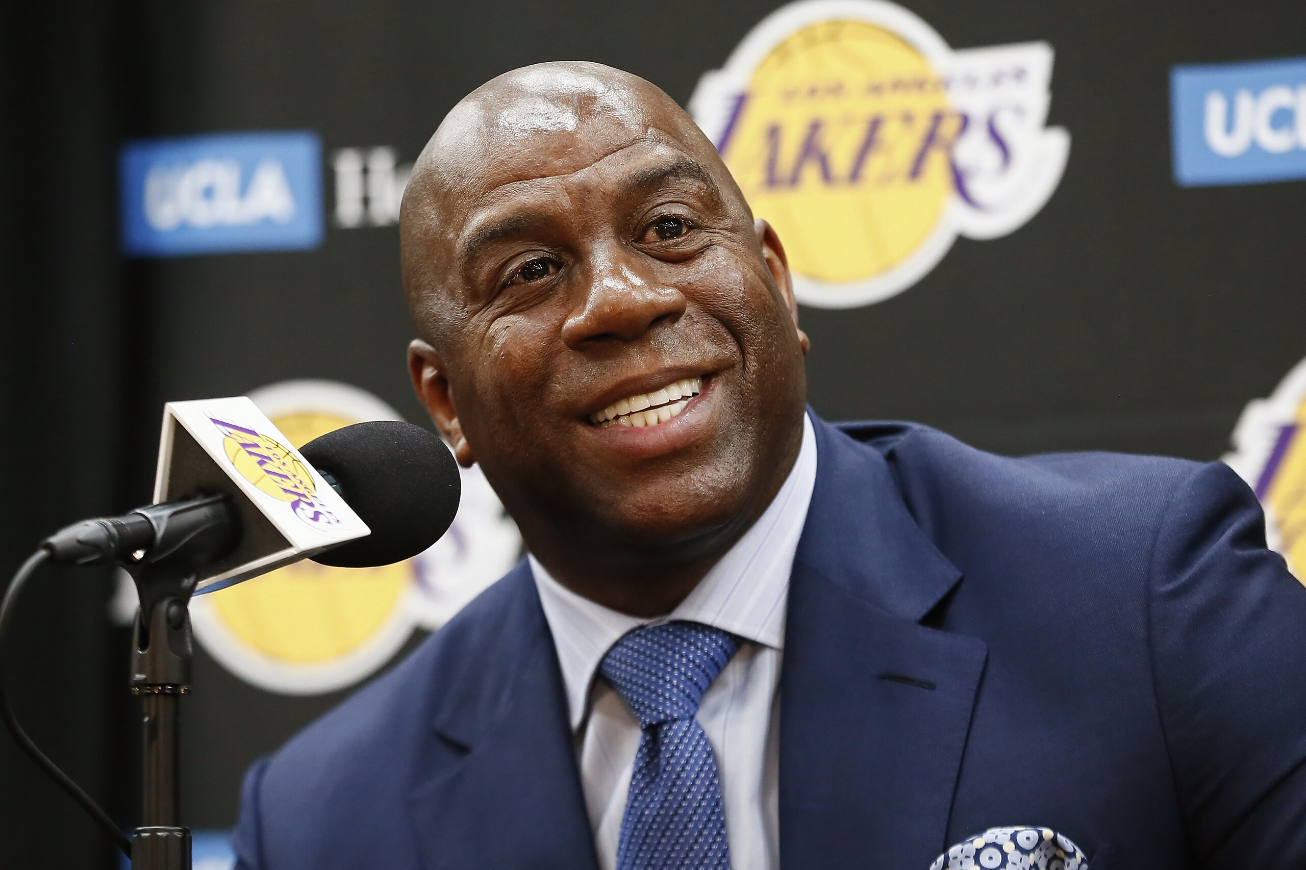EL SEGUNDO, CA - JUNE 26:  Magic Johnson of the Los Angeles Lakers helps introduce 2018 NBA draft pick Moritz Wagner during an introductory press conference at the UCLA Health Training Center on June 26, 2018 in El Segundo, California. NOTE TO USER: User expressly acknowledges and agrees that, by downloading and/or using this photograph, user is consenting to the terms and conditions of the Getty Images License Agreement. Mandatory Copyright Notice: Copyright 2018 NBAE (Photo by Chris Elise/NBAE via Getty Images)