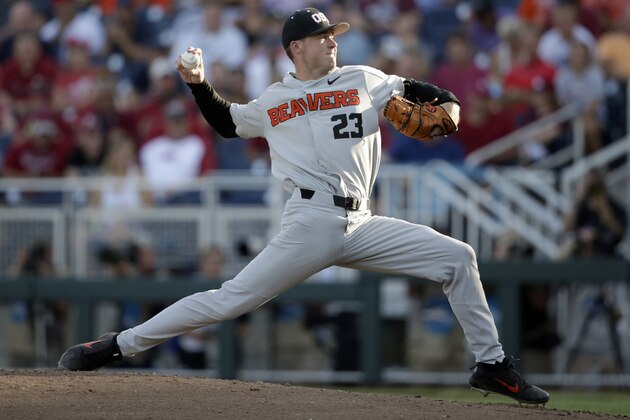 Oregon State's Kevin Abel (23) works against Arkansas during the fourth inning in Game 3 of the NCAA College World Series baseball finals in Omaha, Neb., Thursday, June 28, 2018. (AP Photo/Nati Harnik)