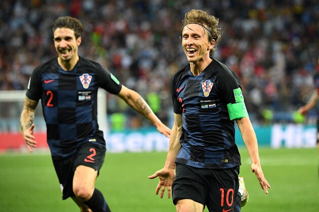 Croatia's midfielder Luka Modric (R) celebrates after scoring their second goal during the Russia 2018 World Cup Group D football match between Argentina and Croatia at the Nizhny Novgorod Stadium in Nizhny Novgorod on June 21, 2018. (Photo by Johannes EISELE / AFP) / RESTRICTED TO EDITORIAL USE - NO MOBILE PUSH ALERTS/DOWNLOADS (Photo credit should read JOHANNES EISELE/AFP/Getty Images) Croatia's midfielder Luka Modric (R) celebrates after scoring their second goal during the Russia 2018 World Cup Group D football match between Argentina and Croatia at the Nizhny Novgorod Stadium in Nizhny Novgorod on June 21, 2018. (Photo by Johannes EISELE / AFP) / RESTRICTED TO EDITORIAL USE - NO MOBILE PUSH ALERTS/DOWNLOADS (Photo credit should read JOHANNES EISELE/AFP/Getty Images)