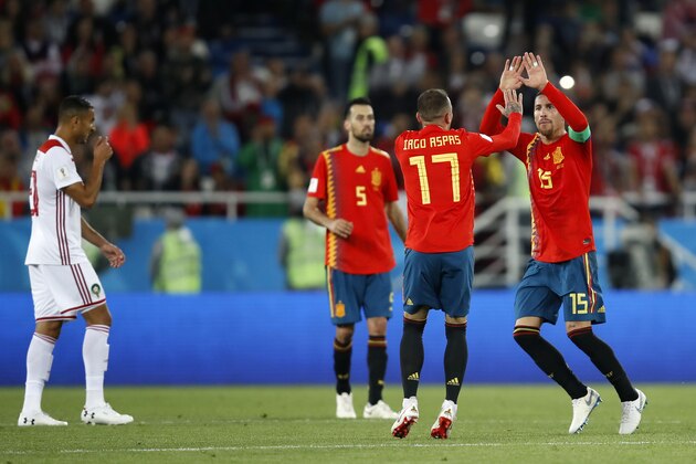 KALININGRAD, RUSSIA - JUNE 25:  Iago Aspas of Spain celebrates with teammate Sergio Ramos after scoring his team's second goal during the 2018 FIFA World Cup Russia group B match between Spain and Morocco at Kaliningrad Stadium on June 25, 2018 in Kaliningrad, Russia.  (Photo by Julian Finney/Getty Images)