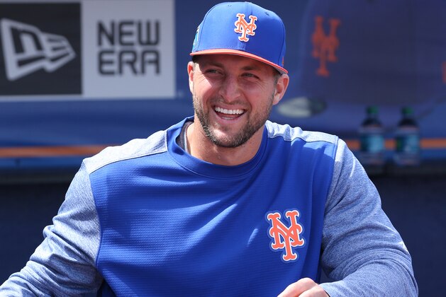 PORT ST. LUCIE, FL - MARCH 7: Tim Tebow #83 of the New York Mets looks on from the dugout at the start of the spring training game against the New York Yankees at First Date Field on March 7, 2018 in Port St. Lucie, Florida. The Yankees defeated the Mets 11-4. (Photo by Joel Auerbach/Getty Images)