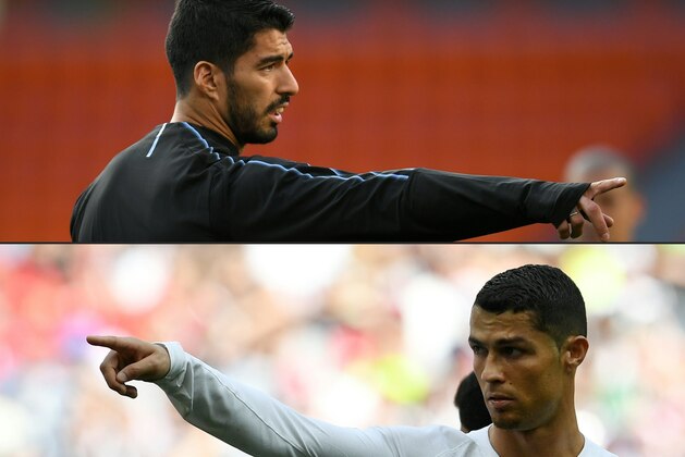 (COMBO) This combination of pictures created on June 28, 2018 shows Uruguay's forward Luis Suarez (top) in Ekaterinburg on June 14, 2018, and Portugal's forward Cristiano Ronaldo in Moscow on June 20, 2018. - The European champions, Portugal, will face Uruguay in Sochi on June 30, for a place in the quarter-finals after finishing as runners-up behind Spain in Group B. (Photos by JORGE GUERRERO and Francisco LEONG / AFP) / RESTRICTED TO EDITORIAL USE - NO MOBILE PUSH ALERTS/DOWNLOADS        (Photo credit should read JORGE GUERRERO,FRANCISCO LEONG/AFP/Getty Images)