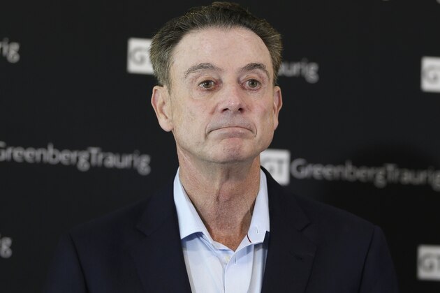 Former Louisville basketball coach Rick Pitino talks to reporters during a news conference in New York, Wednesday, Feb. 21, 2018. Pitino held the news conference in the wake of an NCAA decision in a sex scandal case that strips the Cardinals program of 123 victories, a national championship and $600,000 in post-season revenue. (AP Photo/Seth Wenig)