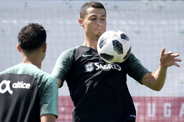 Portugal's forward Cristiano Ronaldo controls the ball during a training session at the team's base camp in Kratovo on June 27, 2018 ahead of their Russia 2018 World Cup football match against Uruguay in Sochi on June 30. (Photo by JUAN MABROMATA / AFP)        (Photo credit should read JUAN MABROMATA/AFP/Getty Images)