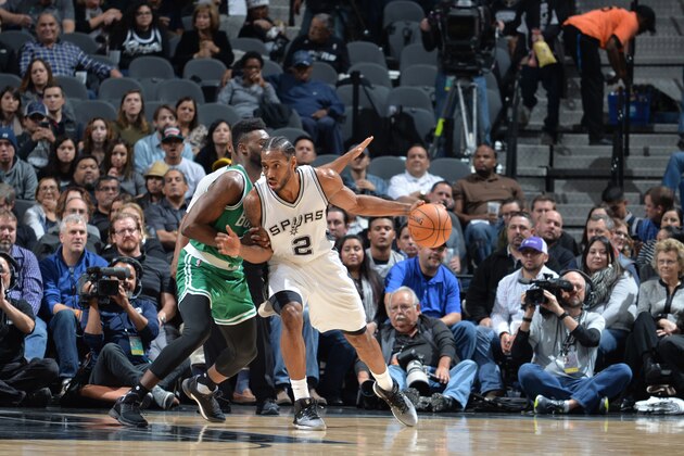 SAN ANTONIO, TX - DECEMBER 14: Kawhi Leonard #2 of the San Antonio Spurs posts up against the Boston Celtics on December 14, 2016 at the AT&T Center in San Antonio, Texas. NOTE TO USER: User expressly acknowledges and agrees that, by downloading and or using this photograph, user is consenting to the terms and conditions of the Getty Images License Agreement. Mandatory Copyright Notice: Copyright 2016 NBAE (Photos by Mark Sobhani/NBAE via Getty Images)