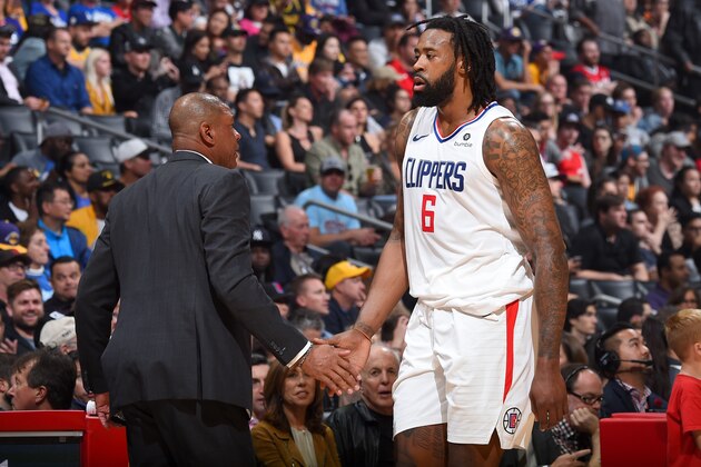 LOS ANGELES, CA - APRIL 11: Head Coach Doc Rivers and DeAndre Jordan #6 of the LA Clippers during the game against the Los Angeles Lakers on April 11, 2018 at STAPLES Center in Los Angeles, California. NOTE TO USER: User expressly acknowledges and agrees that, by downloading and/or using this photograph, user is consenting to the terms and conditions of the Getty Images License Agreement. Mandatory Copyright Notice: Copyright 2018 NBAE (Photo by Adam Pantozzi/NBAE via Getty Images)