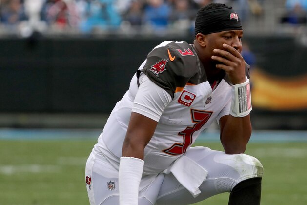 CHARLOTTE, NC - DECEMBER 24:  Jameis Winston #3 of the Tampa Bay Buccaneers reacts between plays against the Carolina Panthers in the fourth quarter during their game at Bank of America Stadium on December 24, 2017 in Charlotte, North Carolina.  (Photo by Streeter Lecka/Getty Images)