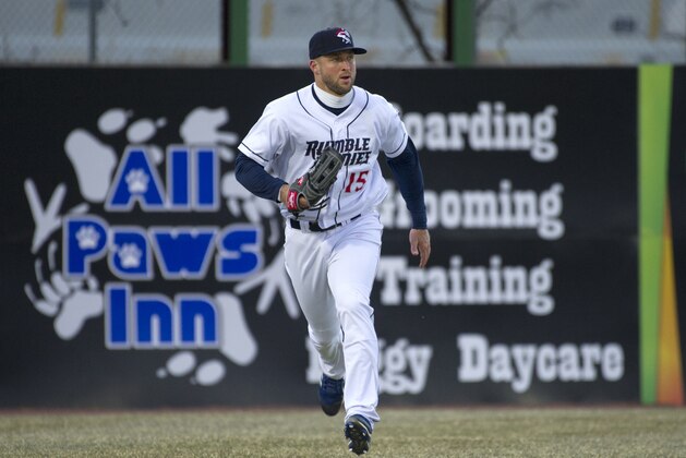 New York Mets outfielder Tim Tebow runs in the outfield during his debut with the Binghamton Rumble Ponies, against the Portland Sea Dogs in a Double-A baseball game Thursday, April 5, 2018, in Binghamton, N.Y. (AP Photo/Matt Smith)