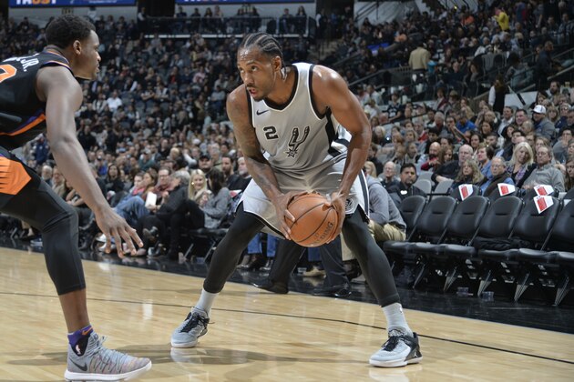 SAN ANTONIO, TX - JANUARY 5: Kawhi Leonard #2 of the San Antonio Spurs handles the ball against the Phoenix Suns on January 5, 2018 at the AT&T Center in San Antonio, Texas. NOTE TO USER: User expressly acknowledges and agrees that, by downloading and or using this photograph, user is consenting to the terms and conditions of the Getty Images License Agreement. Mandatory Copyright Notice: Copyright 2018 NBAE (Photos by Mark Sobhani/NBAE via Getty Images)