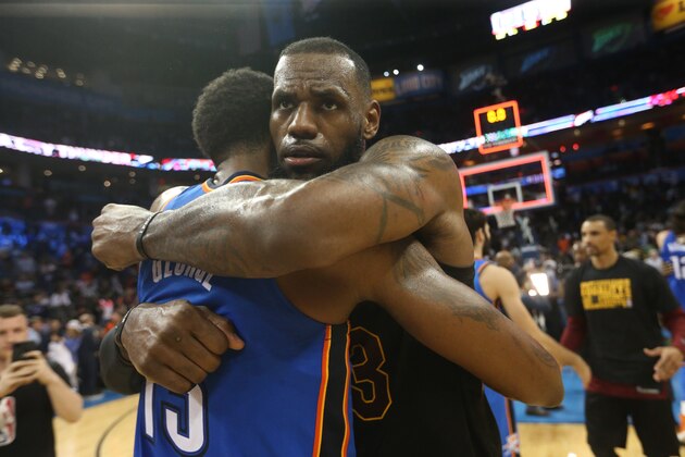 OKLAHOMA CITY, OK - FEBRUARY 13:  LeBron James #23 of the Cleveland Cavaliers and Paul George #13 of the Oklahoma City Thunder hug after the game on February 13, 2018 at Chesapeake Energy Arena in Oklahoma City, Oklahoma. NOTE TO USER: User expressly acknowledges and agrees that, by downloading and or using this photograph, User is consenting to the terms and conditions of the Getty Images License Agreement. Mandatory Copyright Notice: Copyright 2018 NBAE (Photo by Layne Murdoch/NBAE via Getty Images)