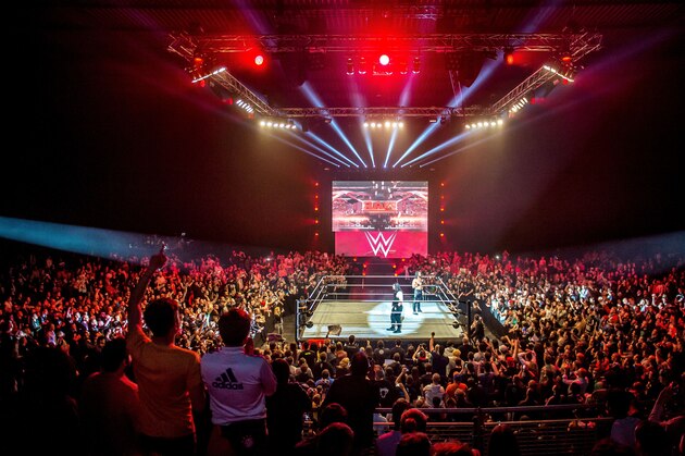 Roman and Seth celebrate in the ring during the WWE show at Zenith Arena on may 09, 2017 in Lille, France. / AFP PHOTO / PHILIPPE HUGUEN        (Photo credit should read PHILIPPE HUGUEN/AFP/Getty Images)