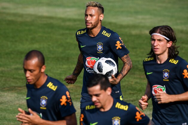L to R, Brazil's defender Miranda, Brazil's forward Neymar, Brazil's defender Fagner and Brazil's defender Filipe Luis take part in a training session at the Yug Sport Stadium, in Sochi, on June 29, 2018, during the Russia 2018 FIFA World Cup football tournament. (Photo by Nelson Almeida / AFP)        (Photo credit should read NELSON ALMEIDA/AFP/Getty Images)