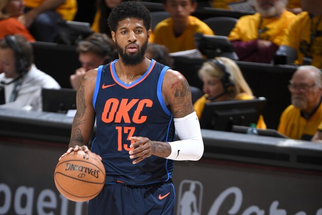 SALT LAKE CITY, UT - APRIL 27: Paul George #13 of the Oklahoma City Thunder handles the ball against the Utah Jazz in Game Six of the Western Conference Quarterfinals during the 2018 NBA Playoffs on April 27, 2018 at Vivint Smart Home Arena in Salt Lake City, Utah. NOTE TO USER: User expressly acknowledges and agrees that, by downloading and/or using this photograph, user is consenting to the terms and conditions of the Getty Images License Agreement. Mandatory Copyright Notice: Copyright 2018 NBAE (Photo by Garrett Ellwood/NBAE via Getty Images)