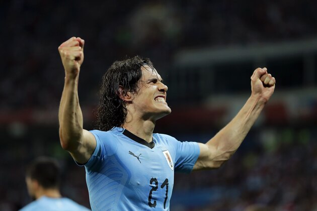 SOCHI, RUSSIA - JUNE 30:  Edinson Cavani of Uruguay celebrates after scoring his team's second goal during the 2018 FIFA World Cup Russia Round of 16 match between Uruguay and Portugal at Fisht Stadium on June 30, 2018 in Sochi, Russia.  (Photo by Richard Heathcote/Getty Images)