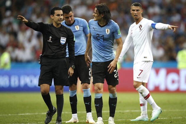 SOCHI, RUSSIA - JUNE 30:  Edinson Cavani of Uruguay leaves the pitch injured during the 2018 FIFA World Cup Russia Round of 16 match between Uruguay and Portugal at Fisht Stadium on June 30, 2018 in Sochi, Russia.  (Photo by Julian Finney/Getty Images)