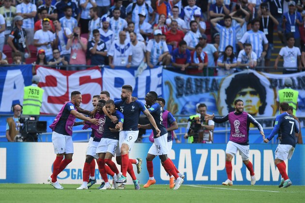 KAZAN, RUSSIA - JUNE 30:  Kylian Mbappe of France is congratulated by team-mates after scoring during the 2018 FIFA World Cup Russia Round of 16 match between France and Argentina at Kazan Arena on June 30, 2018 in Kazan, Russia.  (Photo by Shaun Botterill/Getty Images)