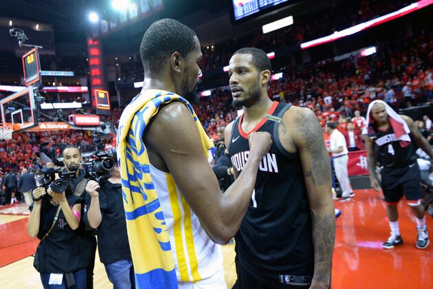 HOUSTON, TX - MAY 28: Kevin Durant #35 of the Golden State Warriors talks to Trevor Ariza #1 of the Houston Rockets after Game Seven of the Western Conference Finals during the 2018 NBA Playoffs on May 28, 2018 at the Toyota Center in Houston, Texas. NOTE TO USER: User expressly acknowledges and agrees that, by downloading and/or using this photograph, user is consenting to the terms and conditions of the Getty Images License Agreement. Mandatory Copyright Notice: Copyright 2018 NBAE (Photo by Noah Graham/NBAE via Getty Images)