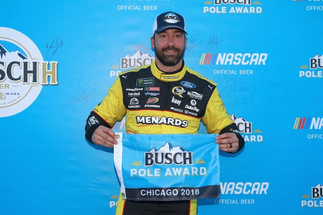JOLIET, IL - JUNE 30:  Paul Menard, driver of the #21 Menards/Sylvania Ford, poses with the Busch Pole Award after posting the fastest lap during qualifying for the Monster Energy NASCAR Cup Series Overton's 400 at Chicagoland Speedway on June 30, 2018 in Joliet, Illinois.  (Photo by Matt Sullivan/Getty Images)