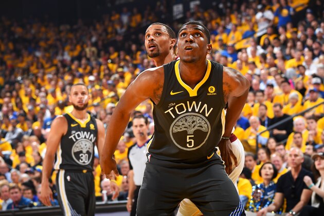 OAKLAND, CA - June 3: Kevon Looney #5 of the Golden State Warriors boxes out George Hill #3 of the Cleveland Cavaliers in Game Two of the 2018 NBA Finals on June 3, 2018 at ORACLE Arena in Oakland, California. NOTE TO USER: User expressly acknowledges and agrees that, by downloading and/or using this photograph, user is consenting to the terms and conditions of the Getty Images License Agreement. Mandatory Copyright Notice: Copyright 2018 NBAE (Photo by Andrew D. Bernstein/NBAE via Getty Images)