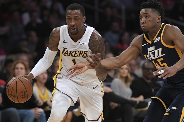 LOS ANGELES, CA - APRIL 08: Kentavious Caldwell-Pope #1 of the Los Angeles Lakers drives past Donovan Mitchell #45 of the Utah Jazz in the first half at Staples Center on April 8, 2018 in Los Angeles, California. The Jazz defeated the Lakers 112-97. NOTE TO USER: User expressly acknowledges and agrees that, by downloading and or using this photograph, User is consenting to the terms and conditions of the Getty Images License Agreement.(Photo by John McCoy/Getty Images) *** Local Caption *** Kentavious Caldwell-Pope; Donovan Mitchell