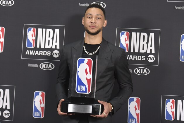Ben Simmons, of the Philadelphia 76ers, poses in the press room with the rookie of the year award at the NBA Awards on Monday, June 25, 2018, at the Barker Hangar in Santa Monica, Calif. (Photo by Richard Shotwell/Invision/AP)