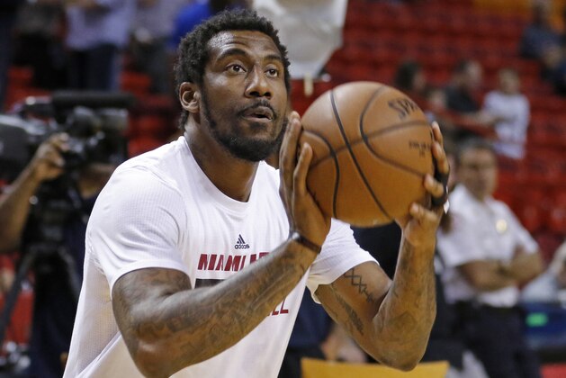 FILE - In this March 28, 2016, file photo, Miami Heat forward Amar'e Stoudemire shoots during warmups before the Heat met the Brooklyn Nets in an NBA basketball game, in Miami. After retiring from the NBA on July 26, Stoudemire signed a two-year contract Monday, Aug. 1, 2016,  to play for Israeli team Hapoel Jerusalem. Stoudemire says it was a very emotional decision for him and his family.  (AP Photo/Joe Skipper, File)