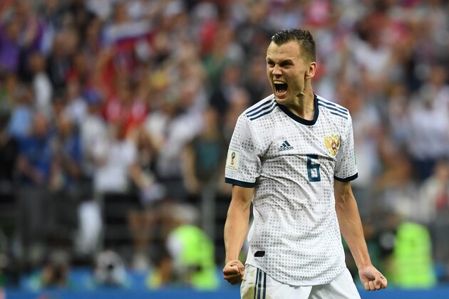 Russia's midfielder Denis Cheryshev celebrates after scoring his penalty during the penalty shoutout in the Russia 2018 World Cup round of 16 football match between Spain and Russia at the Luzhniki Stadium in Moscow on July 1, 2018. (Photo by YURI CORTEZ / AFP) / RESTRICTED TO EDITORIAL USE - NO MOBILE PUSH ALERTS/DOWNLOADS        (Photo credit should read YURI CORTEZ/AFP/Getty Images)